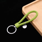 Portachiavi in pelle con ciondolo per auto con cordoncino in pelle intrecciata da 100 pezzi, Baotou With Small Round Piece