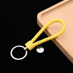 Portachiavi in pelle con ciondolo per auto con cordoncino in pelle intrecciata da 100 pezzi, Baotou With Small Round Piece