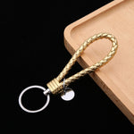 Portachiavi in pelle con ciondolo per auto con cordoncino in pelle intrecciata da 100 pezzi, Baotou With Small Round Piece