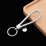 Portachiavi in pelle con ciondolo per auto con cordoncino in pelle intrecciata da 100 pezzi, Baotou With Small Round Piece