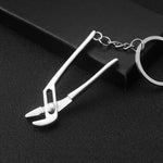 Ciondolo portachiavi per auto con portachiavi in metallo da 10 pezzi, H-540 Activity Wrench, H-389 Hex Wrench, H-391 Glossy Ax, H-388 Thread Ax, H-395 Double Head Wrench, H-405 Double Row Saw, H-402 Hand Saw, H-541 Crooked Nose Pliers, H-399 Pliers  ...