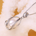 Collana donna con ciondolo perle d'acqua dolce argento 925