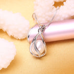 Collana donna con ciondolo perle d'acqua dolce argento 925