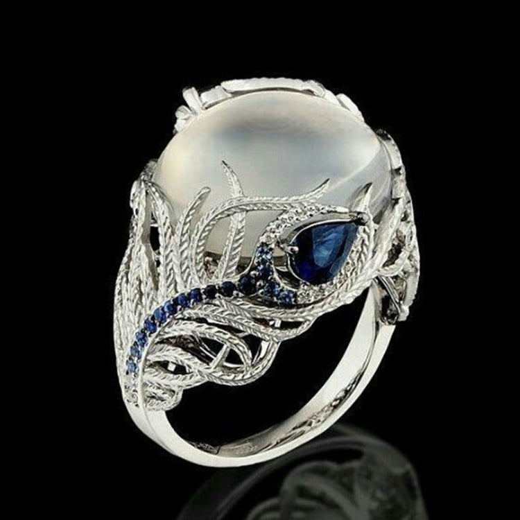 Anello donna in argento con opale naturale e motivo piuma