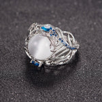 Anello donna in argento con opale naturale e motivo piuma