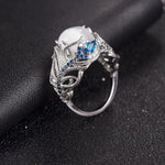 Anello donna in argento con opale naturale e motivo piuma