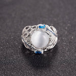 Anello donna in argento con opale naturale e motivo piuma