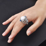 Anello donna in argento con opale naturale e motivo piuma