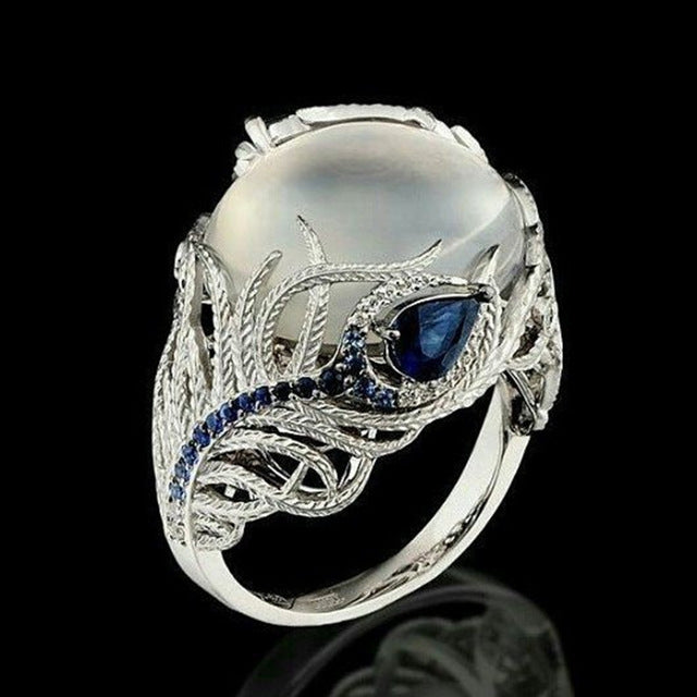 Anello donna in argento con opale naturale e motivo piuma