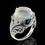 Anello donna in argento con opale naturale e motivo piuma