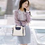 Borsa da donna TFZ 572 in materiale PU a contrasto di colore