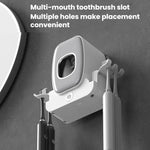 Sterilizzatore intelligente per spazzolini da denti con tecnologia UV e supporto da parete.