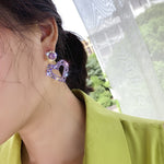 Orecchini Love Silver Needle Orecchini semplici, E2109-12 Purple Diamond, E2109-13 White Diamond, E2112-9 Gold Asymmetric Love, E2112-10 White K Asymmetric Love
