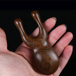Massaggiatore viso in legno di sandalo dorato 11cm