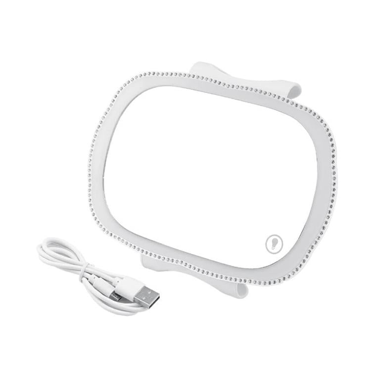 Specchietto per il trucco con luce LED integrata nell'aletta parasole del passeggero dell'auto.