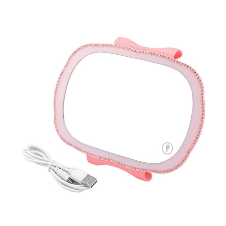 Specchietto per il trucco con luce LED integrata nell'aletta parasole del passeggero dell'auto.