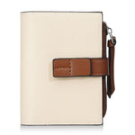 Portafoglio compatto da donna Baellerry N7101 con chiusura a scatto, scomparti multipli per carte e tasca portamonete con cerniera.