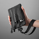 Portafoglio con protezione RFID, portachiavi XPAC, pochette per documenti da viaggio.
