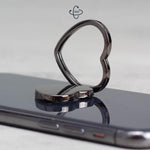 Supporto per telefono in metallo a forma di cuore girevole a 360 gradi con fibbia ad anello.