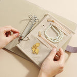 Libro organizer per gioielli in oro e argento con 5 pagine rimovibili foderate in velluto, custodia da viaggio portatile antiossidante.