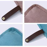 Borsa organizer arrotolabile in velluto per gioielli, con scomparti multipli per collane, bracciali e accessori in oro.