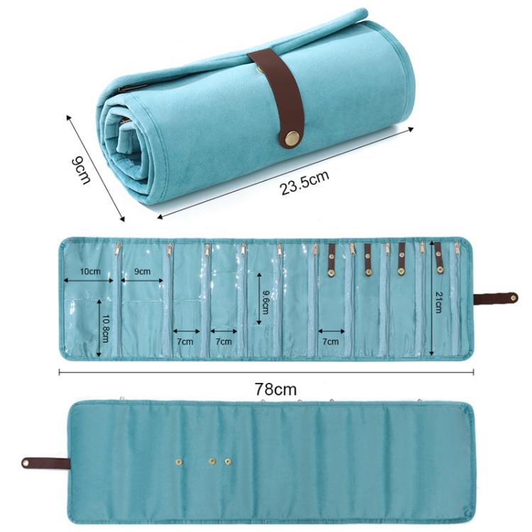 Borsa organizer arrotolabile in velluto per gioielli, con scomparti multipli per collane, bracciali e accessori in oro.