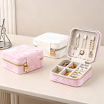 Pochette organizer portatile da viaggio per gioielli con texture in velluto effetto onde d'acqua, ideale per orecchini, collane, anelli e accessori.