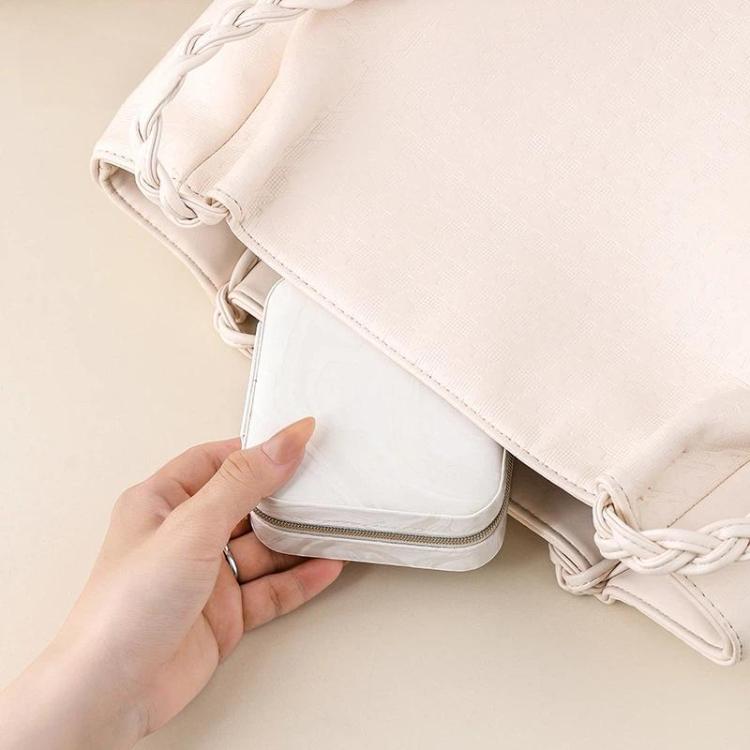 Pochette organizer portatile da viaggio per gioielli con texture in velluto effetto onde d'acqua, ideale per orecchini, collane, anelli e accessori.