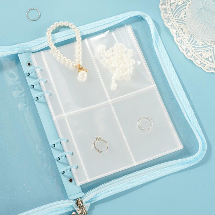 Astuccio multifunzione con cerniera in PVC trasparente e scintillante formato A5, con 25 fogli sfusi e quattro scomparti per riporre gioielli, denaro e foto.