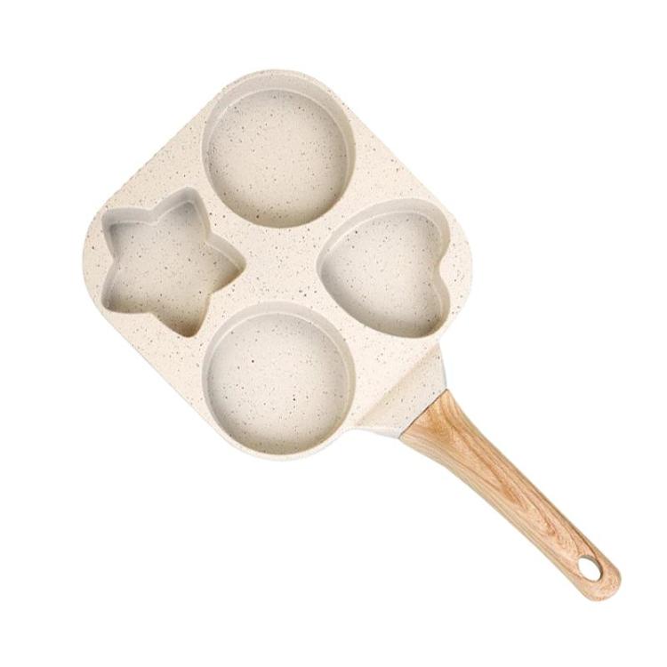 Padella antiaderente a 4 fori per uso domestico, ideale per preparare uova e hamburger.