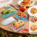 Contenitore per snack in silicone con scomparti per salse rimovibili, ideale per conservare alimenti in viaggio, per picnic e per la preparazione dei pasti.