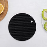 Tovaglietta rotonda in silicone a nido d'ape LsCook, resistente al calore, antiscivolo e isolante.