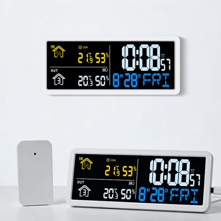 Orologio digitale da parete con sensore esterno wireless per il monitoraggio della temperatura e dell'umidità interna ed esterna.