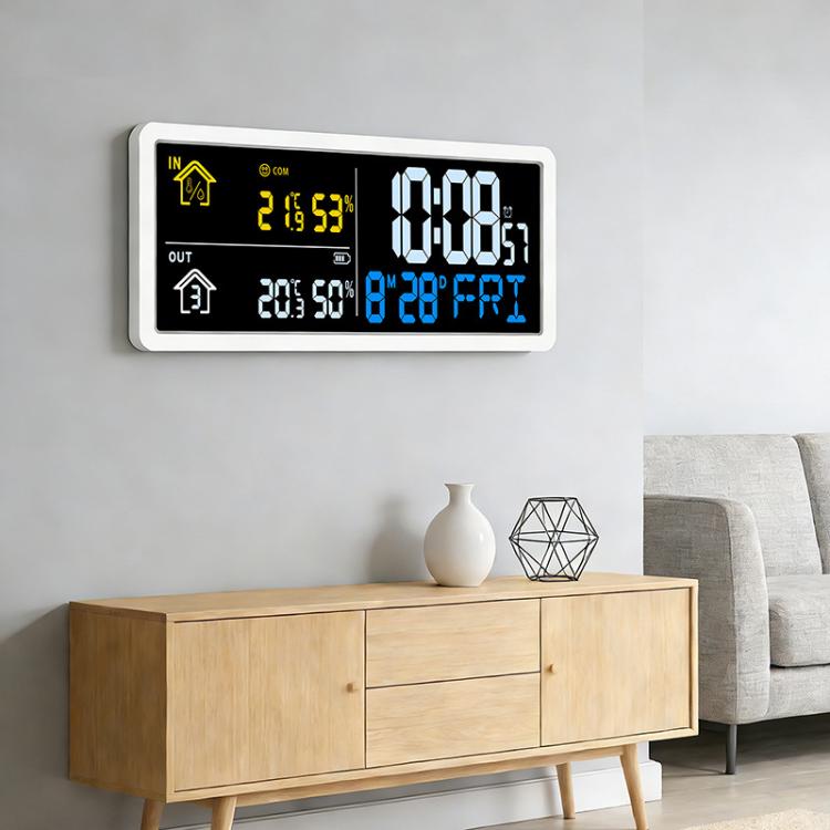 Orologio digitale da parete con sensore esterno wireless per il monitoraggio della temperatura e dell'umidità interna ed esterna.