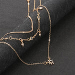 Collana con ciondolo a stella multistrato