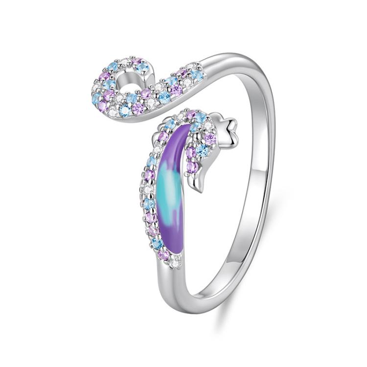 Anello regolabile con apertura a forma di cavalluccio marino, placcato rame e oro bianco.