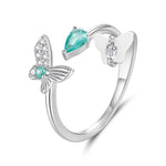 Anello a farfalla a doppio strato regolabile placcato oro bianco, madreperla e zirconi.