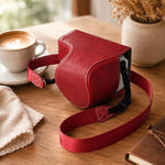 Custodia protettiva in pelle PU per fotocamera Sony ZV-E10 II / ZV-E10M2, mezza copertura con tracolla.