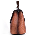 Borsa a mano in pelle bovina pieno fiore con stampa vintage e finitura a mano.