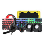 Pacchetto gaming T-WOLF 5 in 1 che include tastiera retroilluminata, mouse cablato, cuffie, altoparlanti e tappetino per mouse.