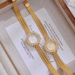 Orologio da polso analogico da donna BS Bee Sister FA1833 con bracciale, lunetta vintage con strass floreali e cinturino in maglia intrecciata.