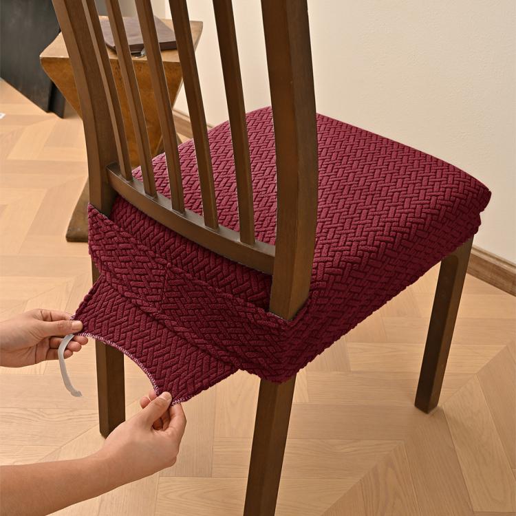 Coprisedia elasticizzato a griglia per sedia da pranzo con cinghie elastiche e fibbie.