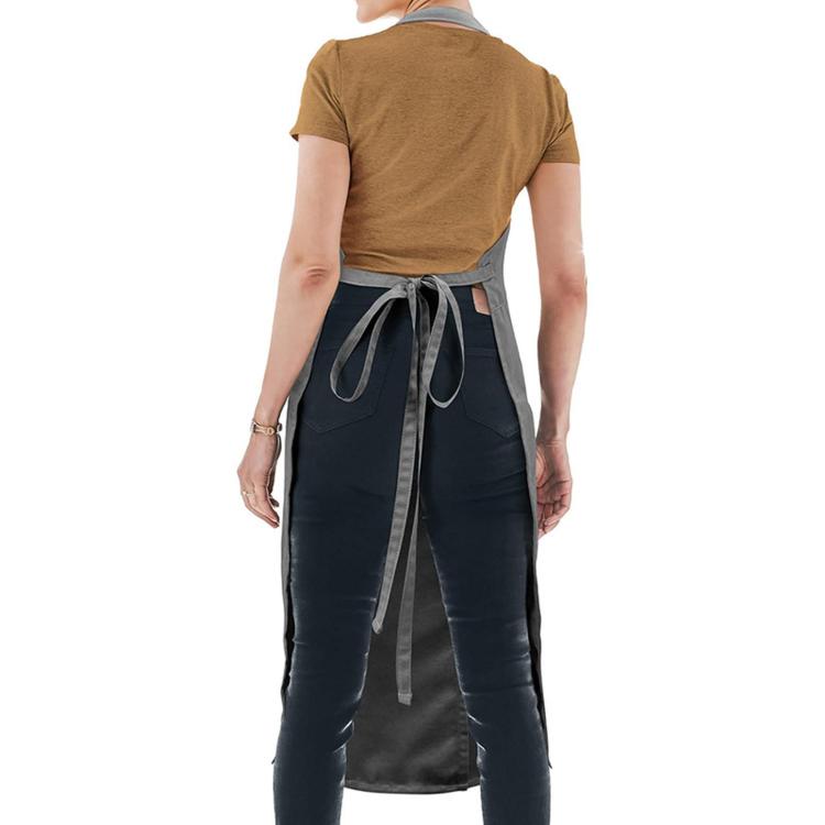 Grembiule da vasaio con gambe separate, regolabile, in misto cotone, con pettorina sovrapposta, tasche e passanti.