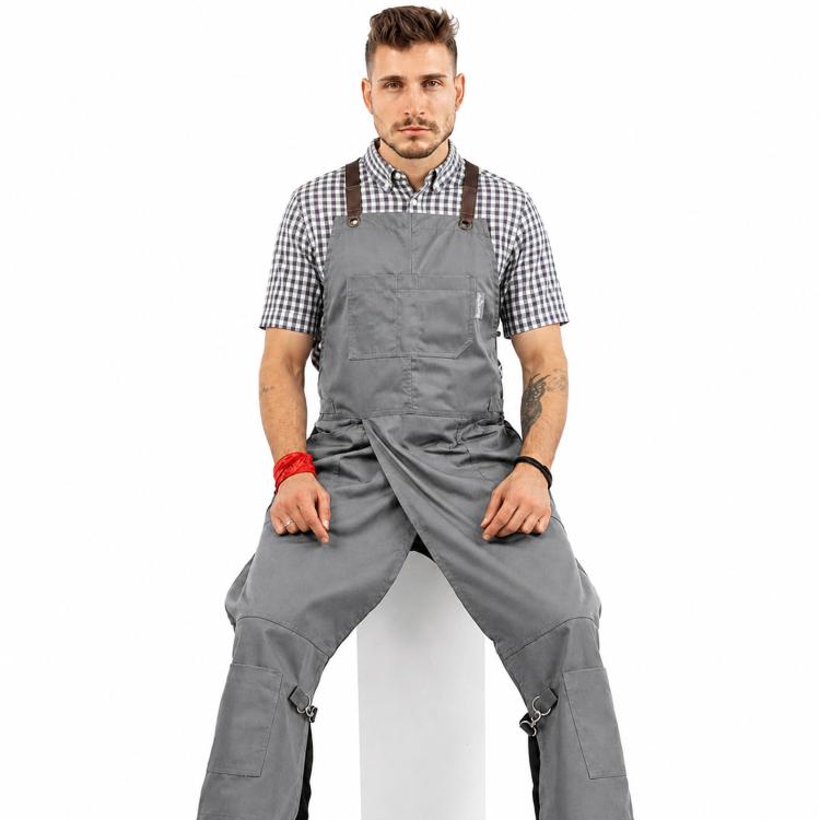 Grembiule da lavoro con gambe divise, schiena incrociata, tasche per barbiere, ceramista e tatuatore.