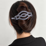Fermagli per capelli opachi a torsione curva per donna, stile francese, ideali per acconciature raccolte.