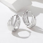 Orecchini con perno in argento e texture metallica ondulata, YIE420, YIE421, YIE422-AL, YIE422-AS, YIE422-BL, YIE422-BS