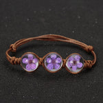 Braccialetti fortunati con perle di vetro di fiori secchi intrecciati a mano