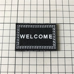 Modello di tappetino di benvenuto con accessori per casa delle bambole di simulazione fatti a mano
