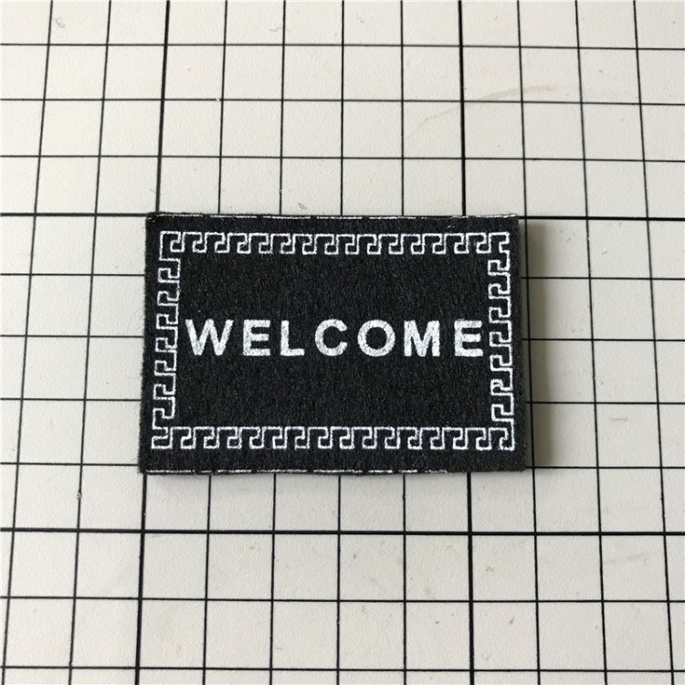 Modello di tappetino di benvenuto con accessori per casa delle bambole di simulazione fatti a mano