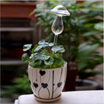 A forma di fungo piante da appartamento fiori alimentatore d'acqua dispositivi automatici in vetro trasparente con irrigazione automatica